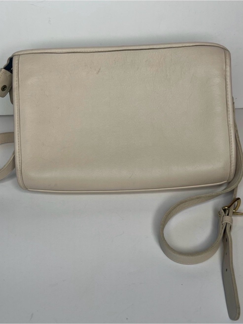 Woman’s Coach Taylor Elegant Cream Leather Crossbody Bag